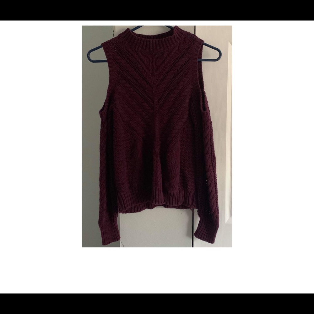 Maroon sweater.